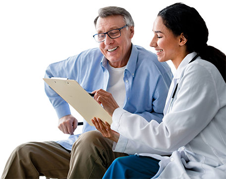 Female medical professional showing a chart to a male patient