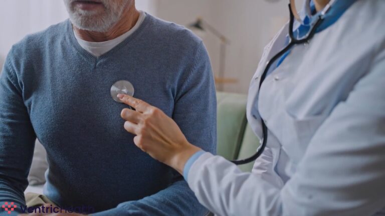 Healthcare professional using a stethoscope to examine a middle-aged man’s chest during a medical checkup.